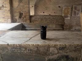 thermopolium old wine bar at old ancient ostia archeological ruins photo