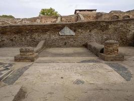 commercial activities mosaic old ancient ostia archeological ruins photo