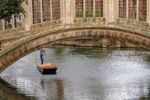 st john college cambridge sights bridge with punting boat photo