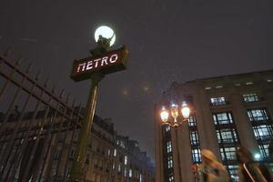 Paris Metro under the snow in winter time photo