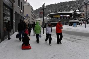 ST MORITZ, SWITZERLAND - DECEMBER 30 2017 - Luxury town crowded of tourists for new years eve photo