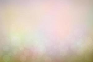 Blur circle bokeh green leaf background. Blurry yellow leaves rays light flare nature backdrop. photo