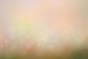 Blur circle bokeh green leaf background. Blurry yellow leaves rays light flare nature backdrop. photo