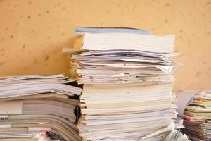 pile of old books and documents photo