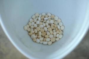 Mothballs deodorize in the urinal. photo