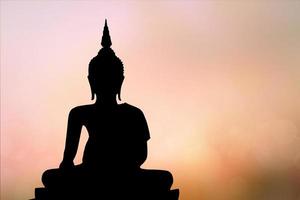 big buddha silhouette sunset background.Makha Bucha Day.Vesak Day.Asanha Bucha.Buddhist Lent. photo