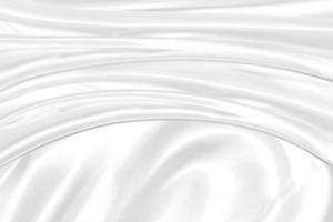 Closeup elegant crumpled of white silk fabric cloth background and texture photo