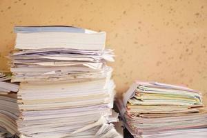 pile of old books and documents photo