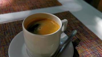 Cup of americano black coffee in restaurant Mexico. video