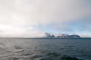 pitzbergen Glacier view on foggy day photo