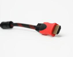 cable in a textile black sheath on a white background, hdmi adapter photo