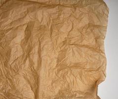 crumpled brown baking parchment paper photo