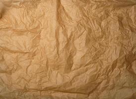 crumpled brown baking parchment paper photo