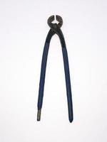 nail puller pliers tang gegep kakaktua  isolated with a white background photo