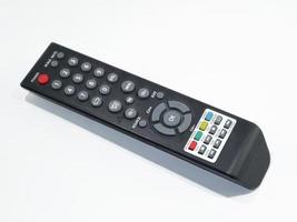 Digital tv remote control on white background photo