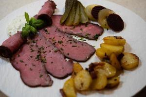 Roastbeef with fried potatoes an Remoulade sauce photo