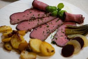 Roastbeef with fried potatoes an Remoulade sauce photo