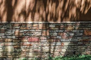 Old brick wall. Texture of old weathered brick wall panoramic background photo