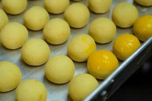 Piles of 'nastar', pastries made from pineapple jam, the process of making Eid cookies photo