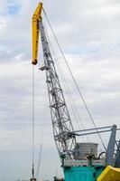 Luffing crane against of blue sky photo