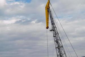 Luffing crane against of blue sky photo