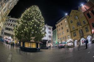 INNSBRUCK, AUSTRIA - DECEMBER 29,2015 - City street with christmas light photo