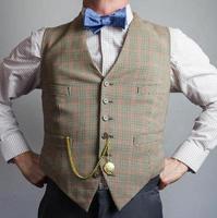 retrato de Caballero en chaleco y arco Corbata con brazos en su caderas. Clásico estilo y retro moda. foto