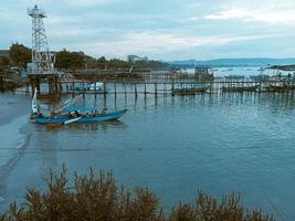 Fishing boat pier in the morning. photo