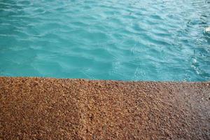 The poolside swimming pool background on daytime photo