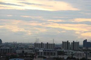 dark blue cloud with white light sky background and city light midnight evening time photo