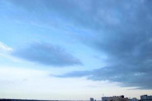 dark blue cloud with white light sky background and city light midnight evening time photo