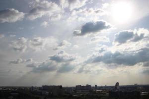 dark blue cloud with white light sky background and city light midnight evening time photo