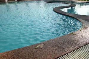 The poolside swimming pool background on daytime photo