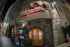 INNSBRUCK, AUSTRIA - DECEMBER 29,2015 - City street with christmas light photo