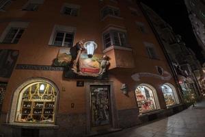 INNSBRUCK, AUSTRIA - DECEMBER 29,2015 - City street with christmas light photo