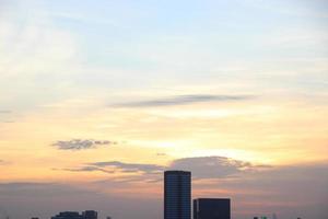 dark blue cloud with white light sky background and city light midnight evening time photo