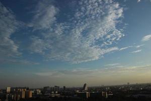 dark blue cloud with white light sky background and city light midnight evening time photo