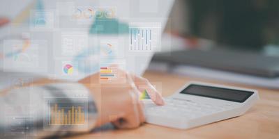 accountant read business statistics chart reports to analyze and improve corporate strategy ,Manage financial and marketing documents, Company growth information ,Managing Business Insights photo