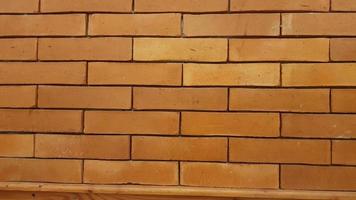 Natural brick wall pattern of red color, terracotta, Background of masonry for copy space photo