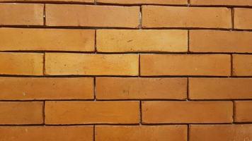 Natural brick wall pattern of red color, terracotta, Background of masonry for copy space photo