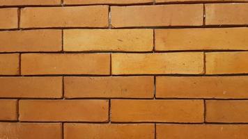 Natural brick wall pattern of red color, terracotta, Background of masonry for copy space photo