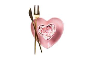 7573 Pink plate and mug and gold cutlery isolated on a transparent background photo