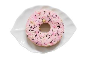 1273 White leaf plate with pink donut isolated on a transparent background photo