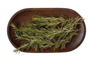 3489 Wooden plate with fresh rosemary isolated on a transparent background photo