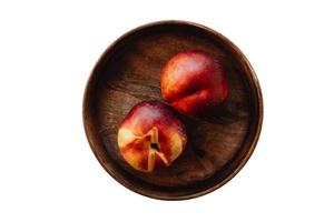 1011 Wooden tray with red apples isolated on a transparent background photo