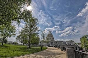 Washington DC Capitol view on cloudy sky background photo