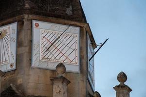 trinity college cambridge sundial at sunset photo