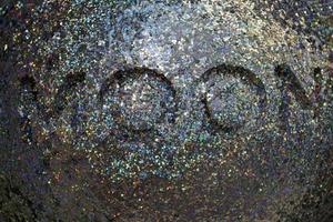 Moon embossed stone writing glitter photo