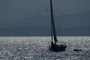 sailboat in genoa ligurian sea photo