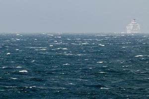 Ship in the tempest in north sea photo